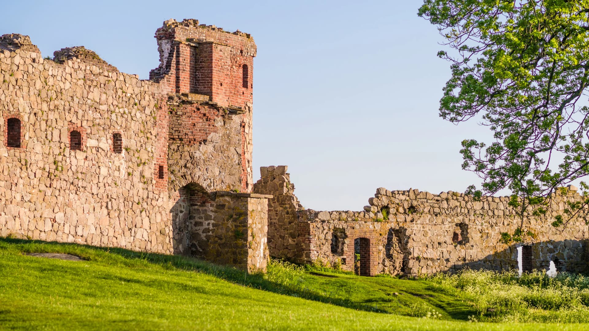 Medieval castle ruin with brick and stone walls