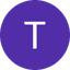 White letter T centered in a purple circle