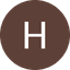 White letter H on brown circular background