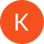 White letter K inside an orange circle