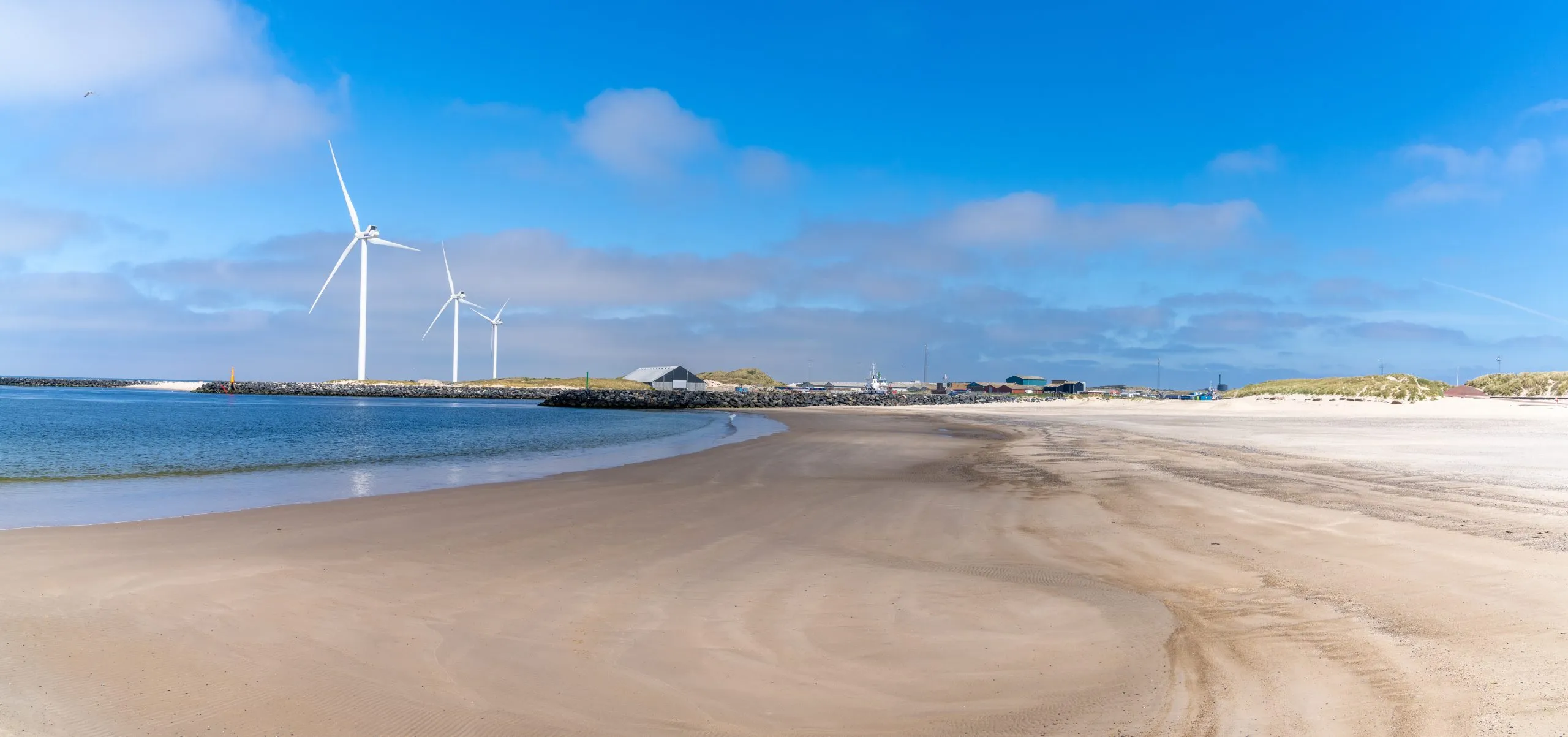 wind turbines and the harbor at Hvinde Sande on the coast of western Denmark